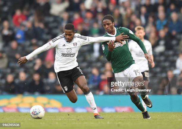 Ryan Sessegnon of Fulham gains possession of the ball against Romaine Sawyers of Brentford during the Sky Bet Championship match between Fulham and...