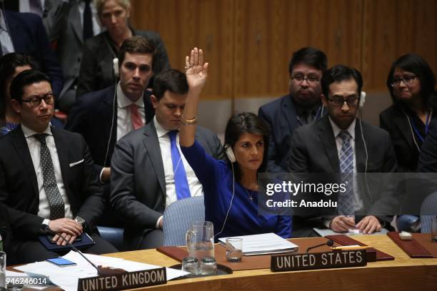 Nikki Haley, US Ambassador to the United Nations votes during a UN Security Council meeting following the United States, United Kingdom and France...