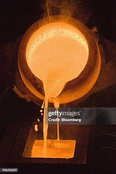 Crucible of molten gold is poured into an ingot mold at Ohio Precious Metals in Jackson, Ohio Thursday, June 1, 2006. Precious metals fell Tuesday,...
