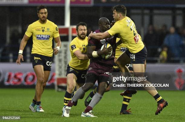Bordeaux-Begles' Mahamadou Diaby is tackled during the French Top 14 rugby union match between Clermont and Bordeaux-Begles at the Michelin Stadium...