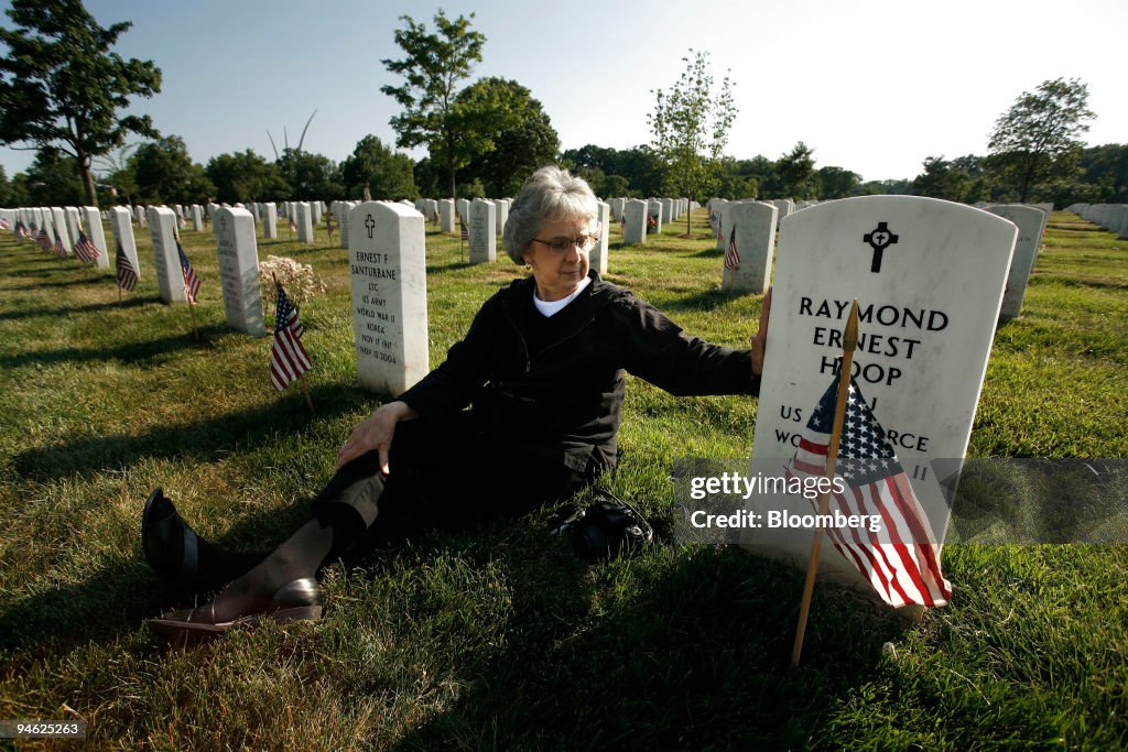 Patsy Jackson sits beside her husband Raymond Ernest Hoop's grave at ...