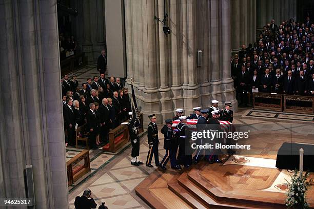 The casket of former President Gerald R. Ford arrives at the alter of the Washington National Cathedral for Celebration and thanksgiving for his...