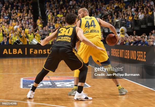 Jeremy Senglin of the MHP Riesen Ludwigsburg and Stefan Peno of Alba Berlin during the Basketball Bundesliga game between Alba Berlin and MHP Riesen...