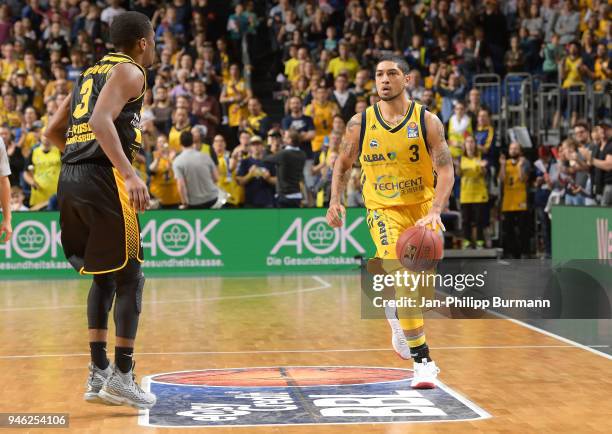 Kerron Johnson of the MHP Riesen Ludwigsburg and Peyton Siva of Alba Berlin during the Basketball Bundesliga game between Alba Berlin and MHP Riesen...