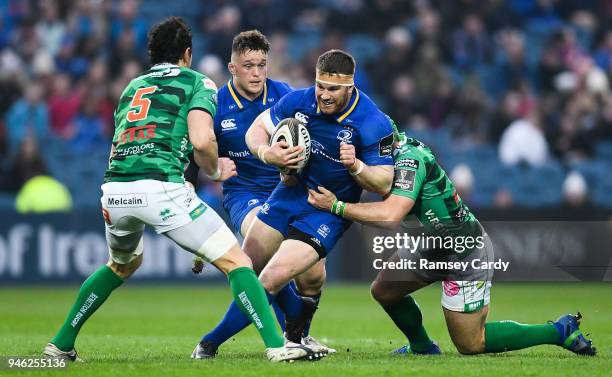 Dublin , Ireland - 14 April 2018; Sean O'Brien of Leinster is tackled by Luca Bigi of Benetton Rugby during the Guinness PRO14 Round 20 match between...