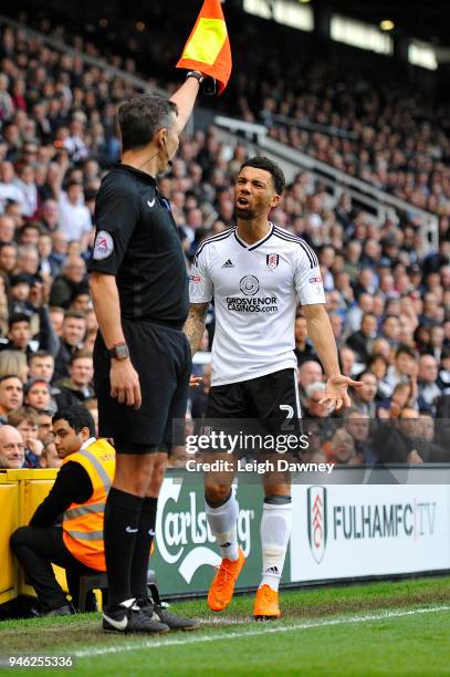 Ryan Fredericks of Fulham reacts at the official's decision during the Sky Bet Championship match between Fulham and Brentford at Craven Cottage on...