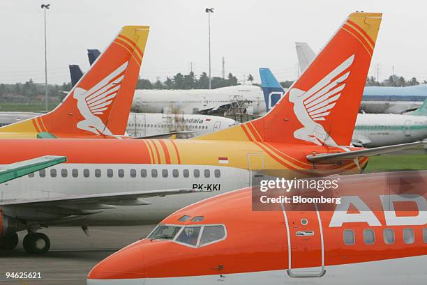 Adam Air planes parked at the Soekarno-Hatta International Airport in Cengkareng, Jakarta, Indonesia, Tuesday, January 2, 2007. Indonesian...