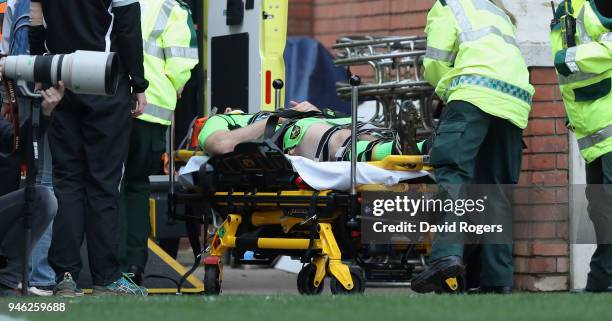 Rob Horne of Northampton Saints is carried off after being knocked out during the Aviva Premiership match between Leicester Tigers and Northampton...