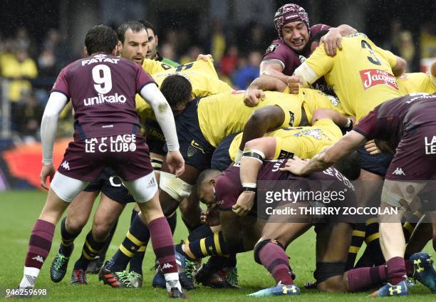 Bordeaux-Begles' and Clermont's players are engaged in a scrum during the French Top 14 rugby union match between Clermont and Bordeaux-Begles at the...