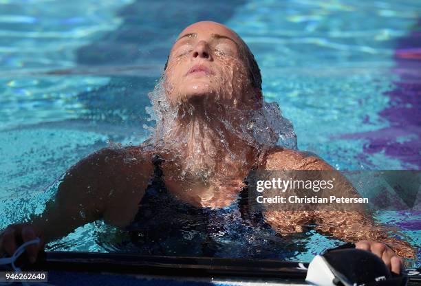 Leah Smith emerges from the water following the Women's 400 LC Meter Freestyle prelims during day three of the TYR Pro Swim Series at the Skyline...