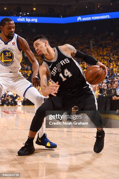 Danny Green of the San Antonio Spurs handles the ball against the Golden State Warriors in Game One of Round One of the 2018 NBA Playoffs on April...