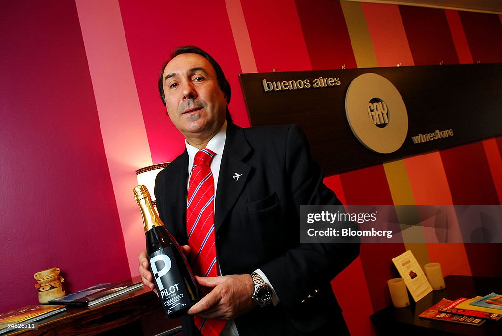 German Arballo, owner of the Buenos Aires Gay Wine Store, ho