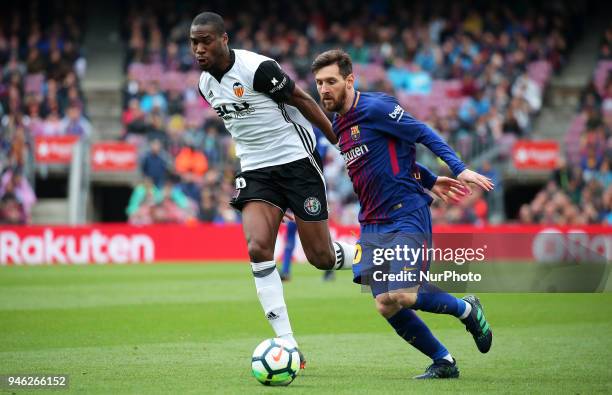 Geoffrey Kondogbia and Leo Messi during the match between FC Barcelona and Valencia CF, played at the Camp Nou Stadium on 14th April 2018 in...