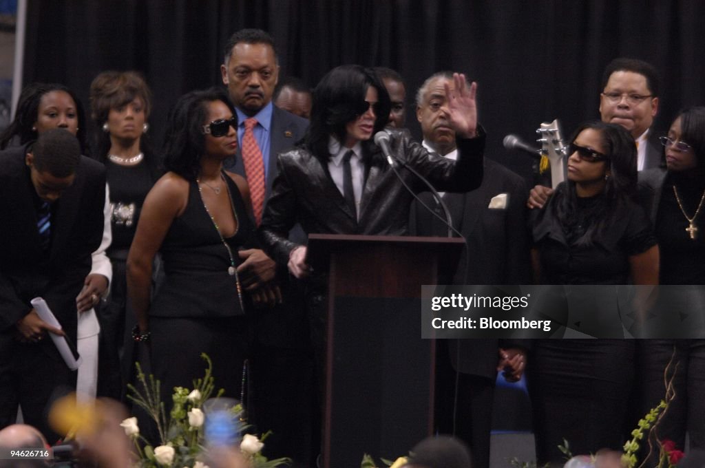 The Reverend Jesse Jackson, red tie, singer Michael Jackson,