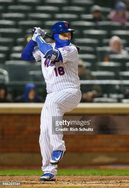Travis d'Arnaud of the New York Mets in action against the Philadelphia Phillies during a game at Citi Field on April 3, 2018 in the Flushing...