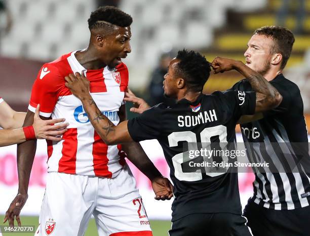 Seydouba Soumah of Partizan fights with the Mitchell Donald of Crvena Zvezda during the Serbian Super League Play Off match at the stadium Rajko...