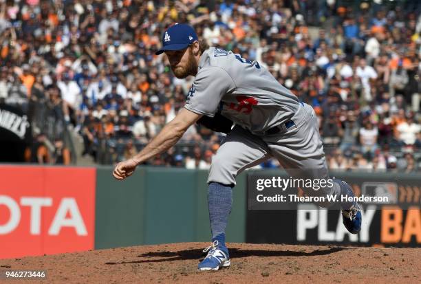 Tony Cingrani of the Los Angeles Dodgers pitches against the San Francisco Giants in the bottom of the eighth inning of a Major League Baseball game...