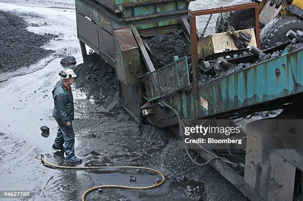 Bryan Roberts, a coal mining plant operator, supervises the coal sorting machine at Aberpergwm Colliery outside Glynneath village in Wales, U.K., on...