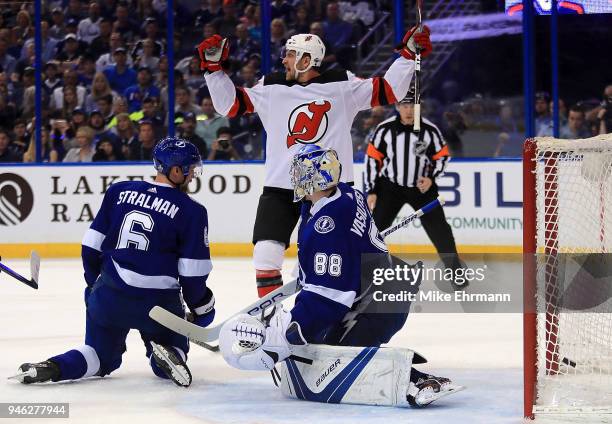 Michael Grabner of the New Jersey Devils celebrates a goal by Nico Hischier in the first period during Game Two of the Eastern Conference First Round...