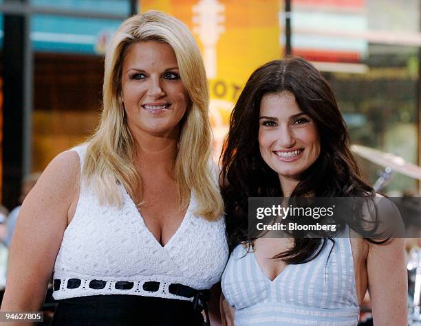 Coutry Singer Trisha Yearwood, left, poses with actress Idina Menzel following their performance during Katie Couric's last day on NBC's "Today"...