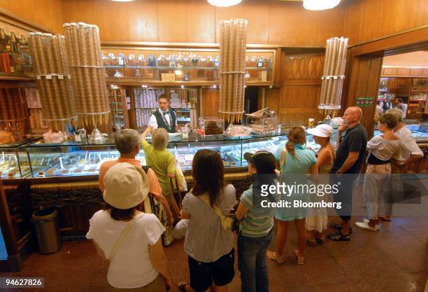 Crowds line up for gelato, or Italian ice cream, at Giolitti in Rome, Italy, Wednesday, Aug. 29, 2007. Even in a town where nothing ever seems to...