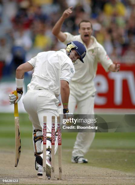 Kevin Pietersen, batting for England, looks around after being bowled out by Australian Stuart Clark, right, on Day 3 of the fourth Ashes Test match...