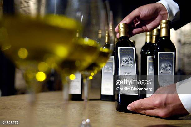 Di Bennardo, maker of Di Bennardo L'Olio d'Oliva, owner Giovanni Di Bennardo shows a bottle of his company's olive oil at an olive oil tasting in a...