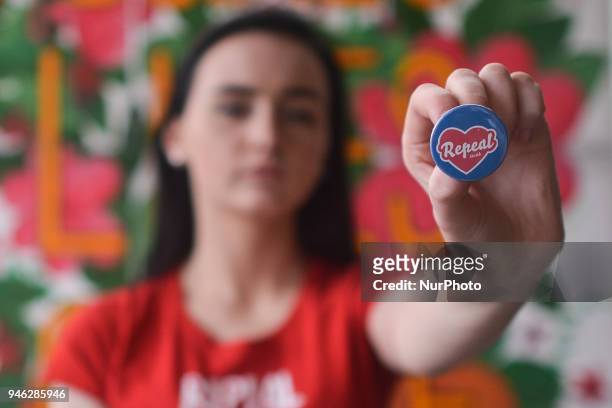 Natalya O'Flaherty, a spoken word artist and an activist holds 'Repeal' badge during a Rally for Equality, Freedom &amp; Choice organised by ROSA -...