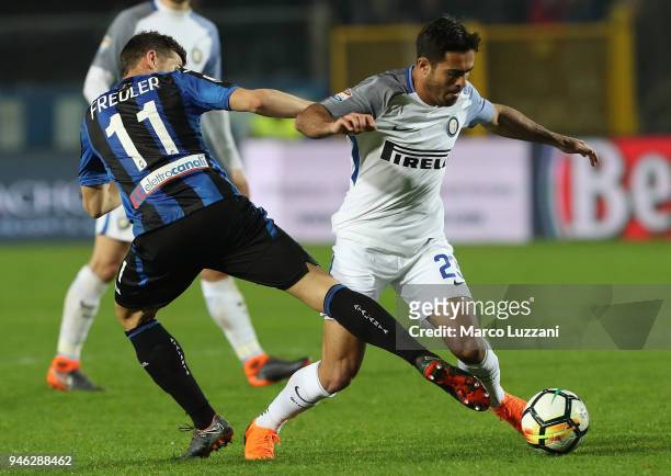 Eder Citadin Martins of FC Internazionale is challenged by Remo Freuler of Atalanta BC during the serie A match between Atalanta BC and FC...