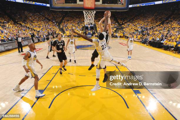 Davis Bertans of the San Antonio Spurs handles the ball against the Golden State Warriors in Game One of Round One during the 2018 NBA Playoffs on...