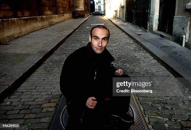 Mabrouck Rachedi, a French second-generation immigrant novelist and author of "Le Poids d'une Ame," or "The Weight of Soul," poses in Paris, France,...