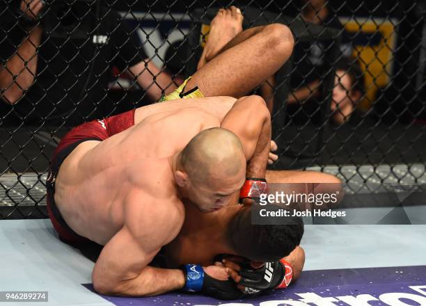 Yushin Okami of Japan controls the body of Dhiego Lima of Brazil in their welterweight fight during the UFC Fight Night event at the Gila Rivera...