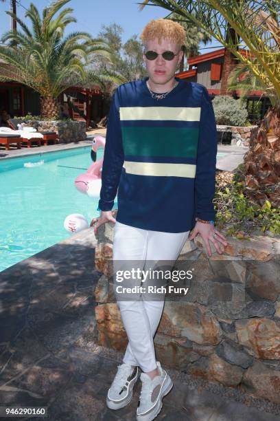 Shaun Ross poolside with H&M at The Sparrows Lodge on April 14, 2018 in Palm Springs, California.