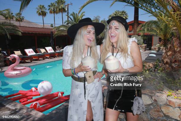 Calli and Sam Beckerman poolside with H&M at The Sparrows Lodge on April 14, 2018 in Palm Springs, California.