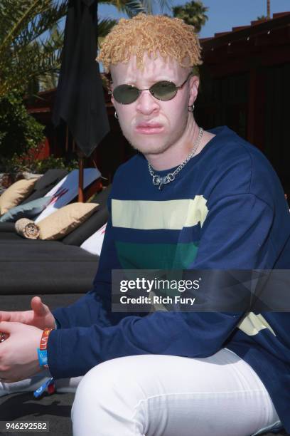 Shaun Ross poolside with H&M at The Sparrows Lodge on April 14, 2018 in Palm Springs, California.