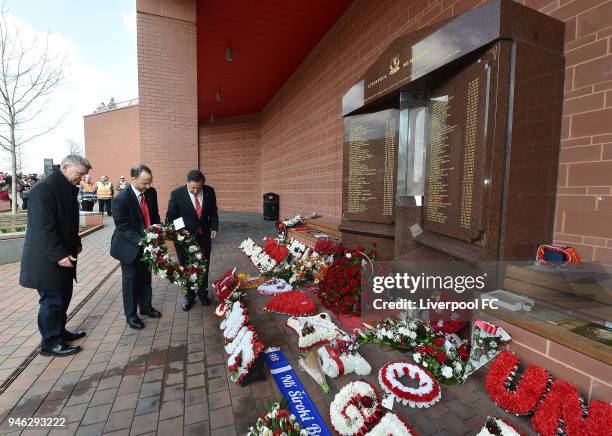 Mike Gordon and Tom Werner co-owners of Liverpool FC pay tribute to victims of the Hillsborough Disaster during the Premier League match between...