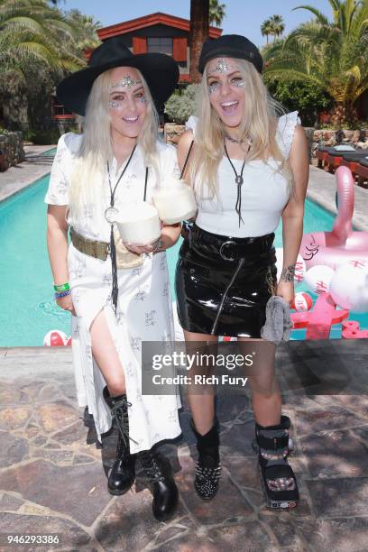 Calli and Sam Beckerman poolside with H&M at The Sparrows Lodge on April 14, 2018 in Palm Springs, California.