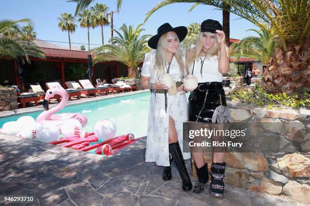 Calli and Sam Beckerman poolside with H&M at The Sparrows Lodge on April 14, 2018 in Palm Springs, California.