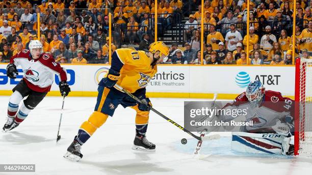 Jonathan Bernier of the Colorado Avalanche makes the save against Nick Bonino of the Nashville Predators in Game Two of the Western Conference First...