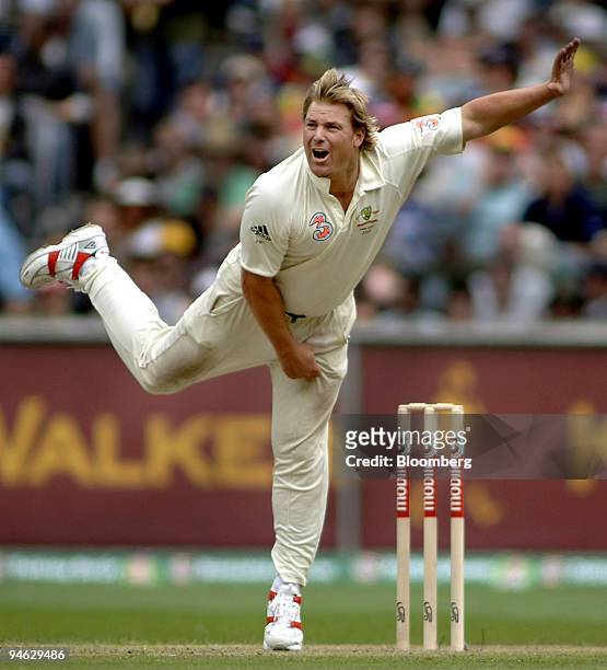 Shane Warne, bowling for Australia, delivers on Day 1 of the fourth Ashes Test match between Australia and England at the Melbourne Cricket Ground,...