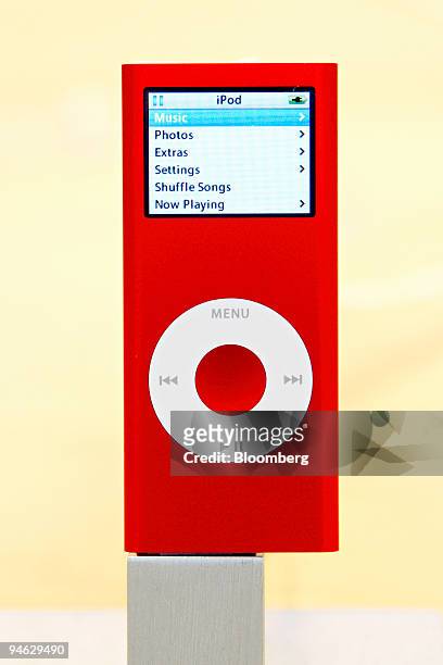The new red iPod nano on display at the Fifth Avenue Apple store in New York City on Friday, October 13, 2006. Apple announced a new red iPod nano,...