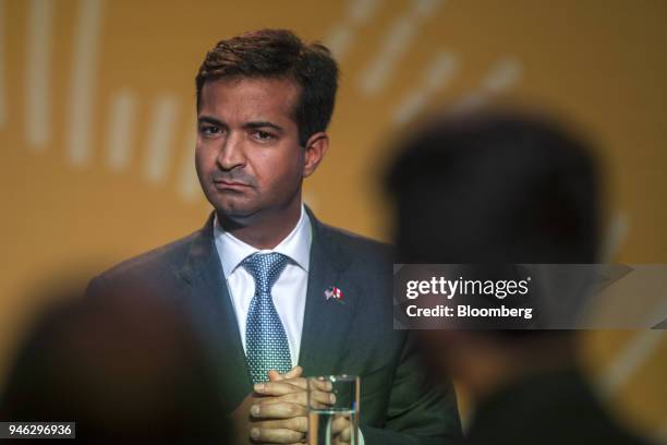 Representative Carlos Curbelo, a Republican from Florida, listens during a press conference at the CEO Summit of the Americas in Lima, Peru, on...