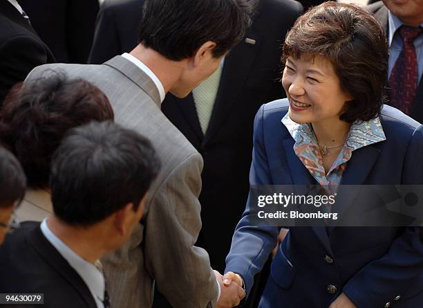 Park Guen-Hye, presidential hopeful and one of the candidates for South Korea's main opposition Grand National Party, is greet as she arrives for a...