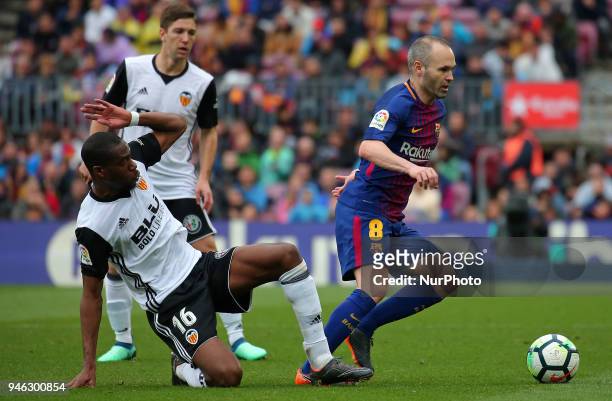 Geoffrey Kondogbia and Andres Iniesta during the match between FC Barcelona and Valencia CF, played at the Camp Nou Stadium on 14th April 2018 in...