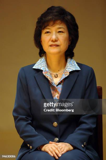 Park Guen-Hye, presidential hopeful and one of the candidates for South Korea's main opposition Grand National Party, listens during a campaign event...