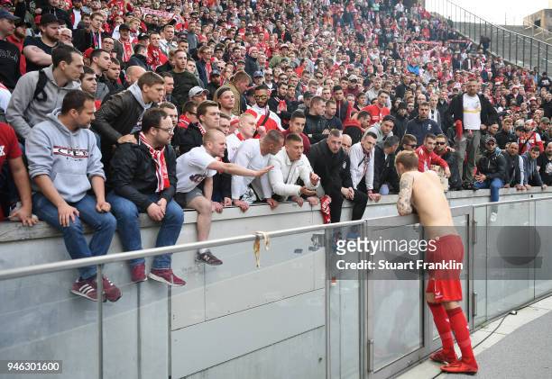 Fans of Cologne make their feelings know to Marcel Risse of Cologne after the Bundesliga match between Hertha BSC and 1. FC Koeln at Olympiastadion...