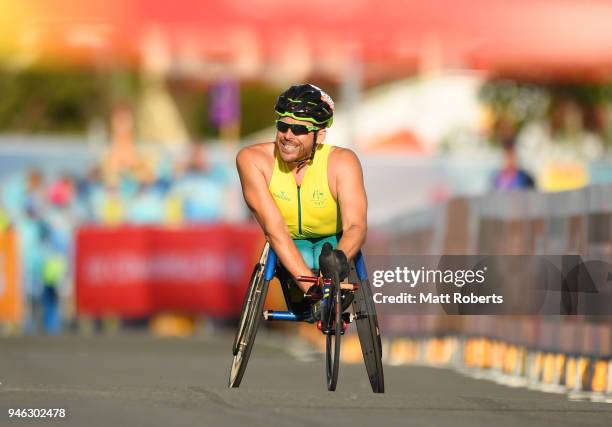 Kurt Fearnley of Australia celebrates as he races to the line to win gold in the Men's T54 marathon on day 11 of the Gold Coast 2018 Commonwealth...