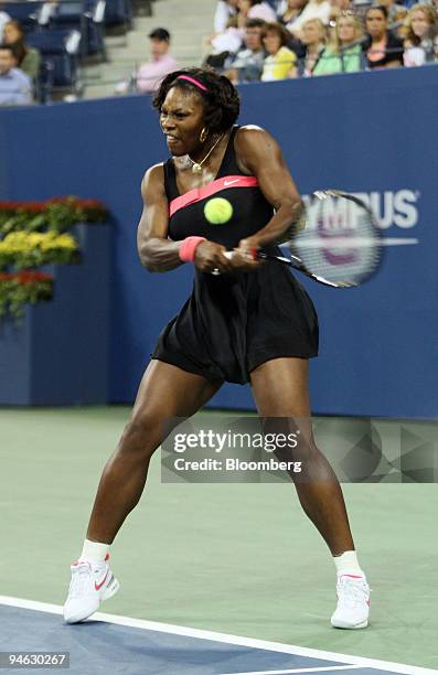 Serena Williams of the United States returns a serve during her match against Angelique Kerber of Germany at the U.S. Open at the Billie Jean King...