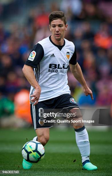 Luciano Vietto of Valencia in action during the La Liga match between Barcelona and Valencia at Camp Nou on April 14, 2018 in Barcelona, Spain.