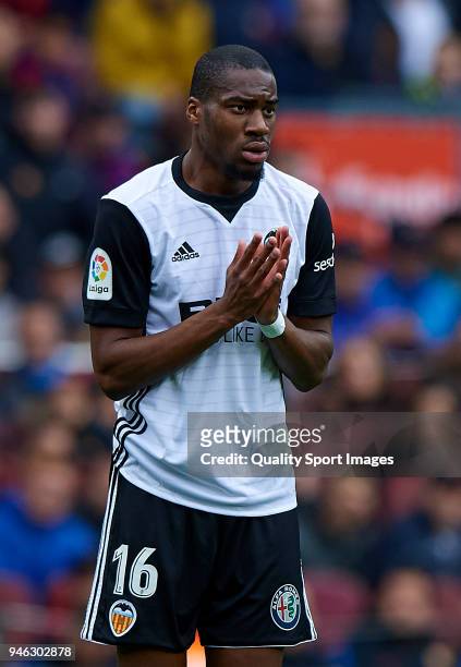 Geoffrey Kondogbia of Valencia reacts during the La Liga match between Barcelona and Valencia at Camp Nou on April 14, 2018 in Barcelona, Spain.